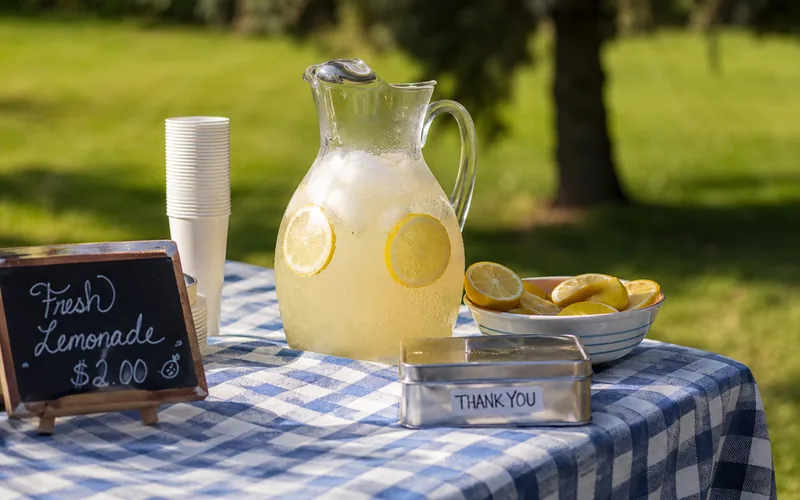 Lemonade stand pitcher and cups